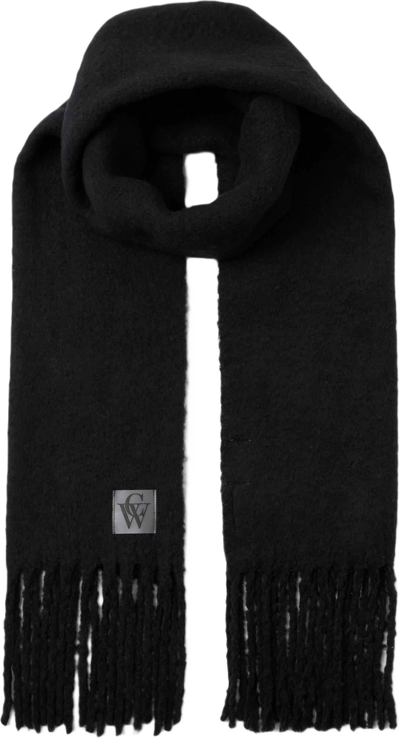 Stickad halsduk med fransar ADA, från Carin Wester, i färgen Black.