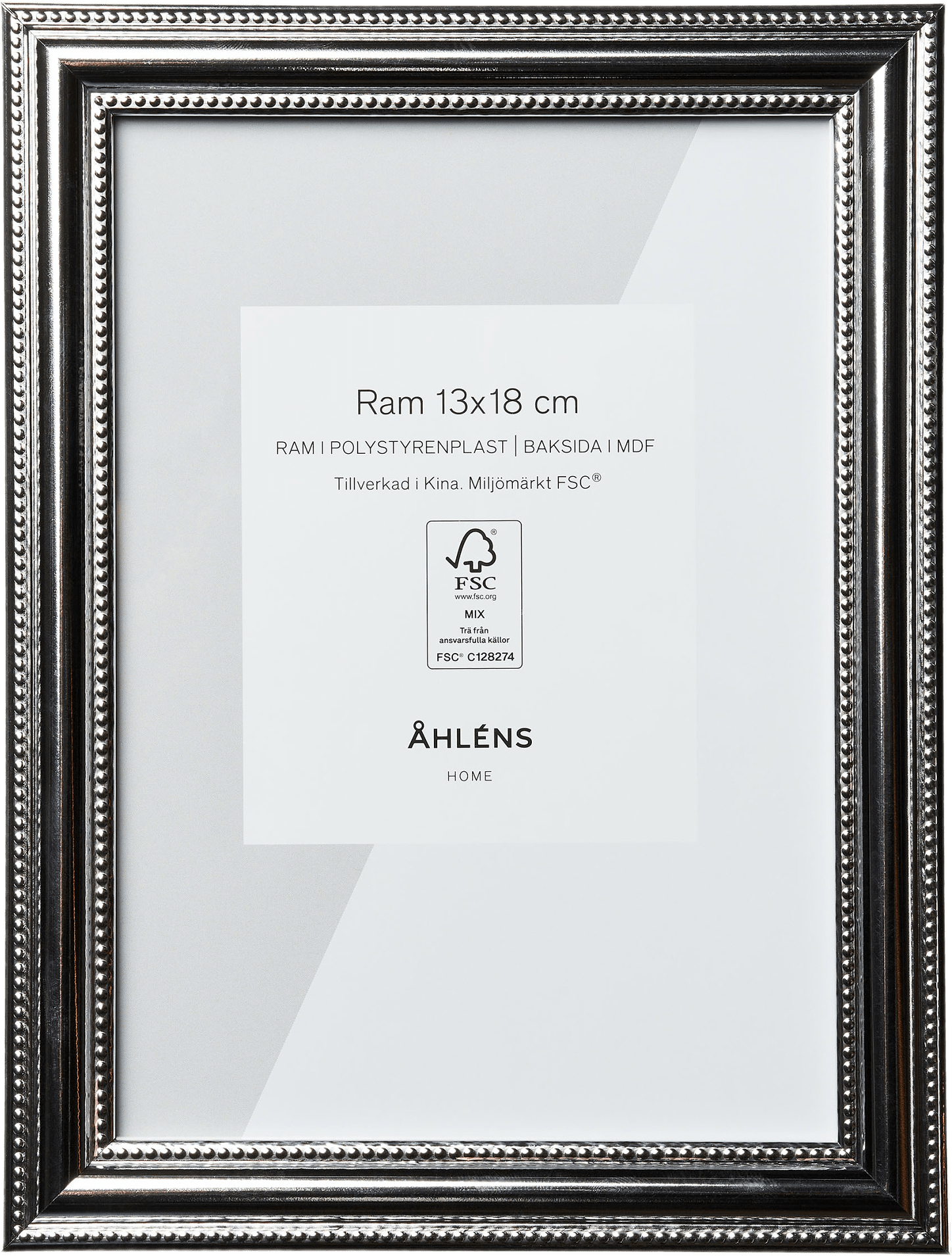 Mönstrad ram 13x18 cm, från Åhléns Home, i färgen Silver.