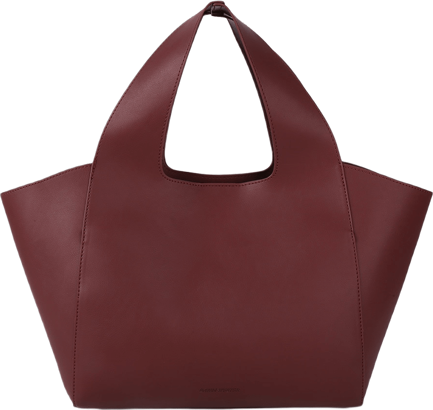 Liten toteväska SANYA, från Carin Wester, i färgen Rust.