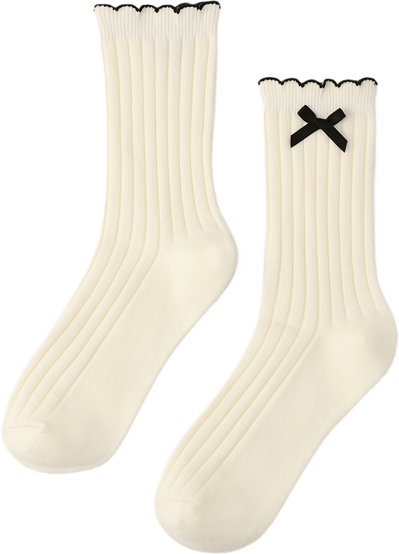 Strumpor med vågig kant, från Å WOMAN, i färgen White.