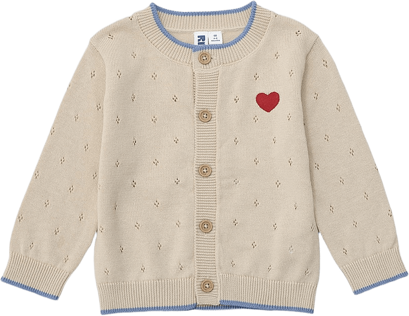 Poientellestickad cardigan MOA, från RIKIKI, i färgen Off White.