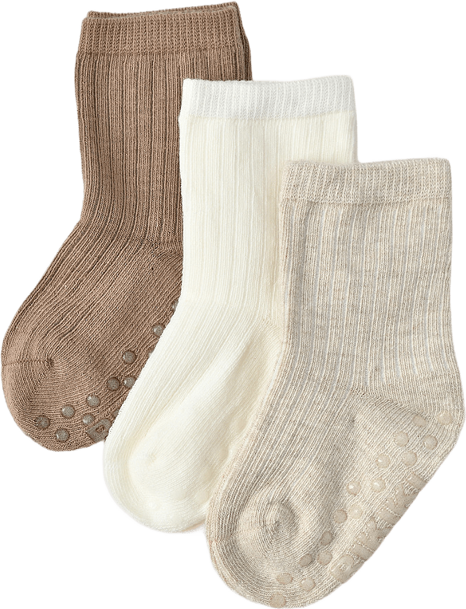 Babystrumpor med halkskydd, 3-pack, från RIKIKI, i färgen Beige.