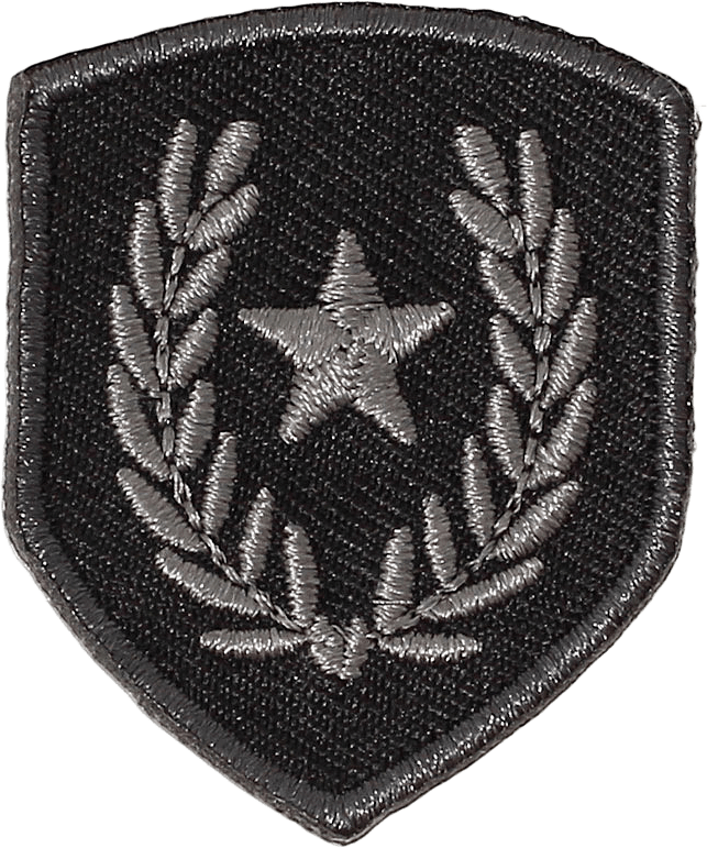 Applikation Blazon, från Trend-Tex, i färgen Svart/Grå.