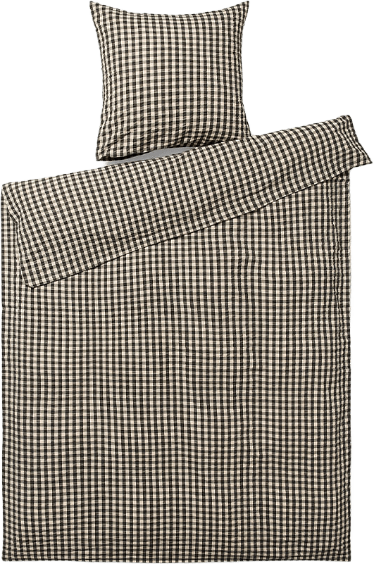 Bæk&Bølge Påslakanset, från JUNA, i färgen Svart/Sand.