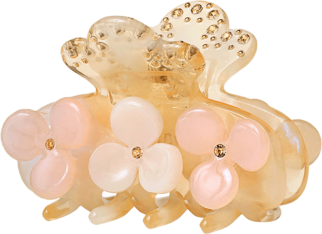 Marguerite hair claw, från Maanesten, i färgen Pumpkin.