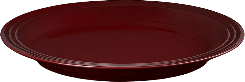 Middagstallrik Signature stengods 27 cm, från Le Creuset, i färgen Garnet.