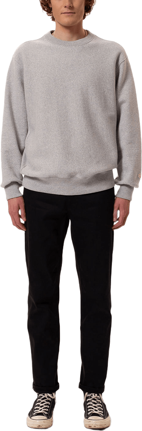 Hasse Crew Neck Sweatshirt Greymelange, från Nudie Jeans, i färgen Greymelange.