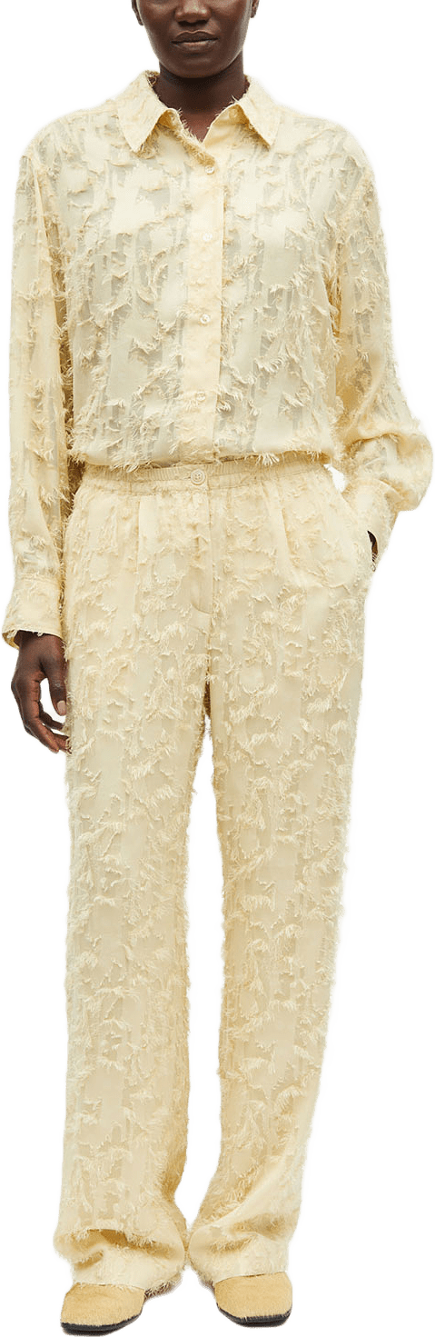 Satove Trousers 15532, från SAMSOE SAMSOE, i färgen Dusty Yellow.