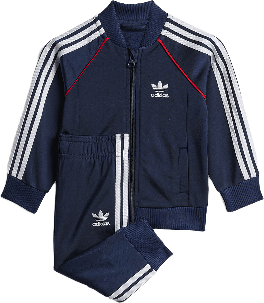 Adicolor SST Tracksuit Barn, från Adidas Originals, i färgen Nindig/Nindig/White.