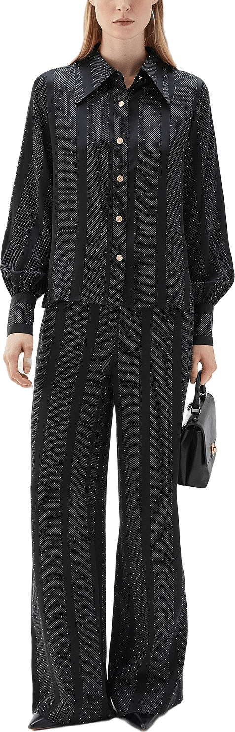 Anita Blouse, från Busnel, i färgen Black/Ecru.