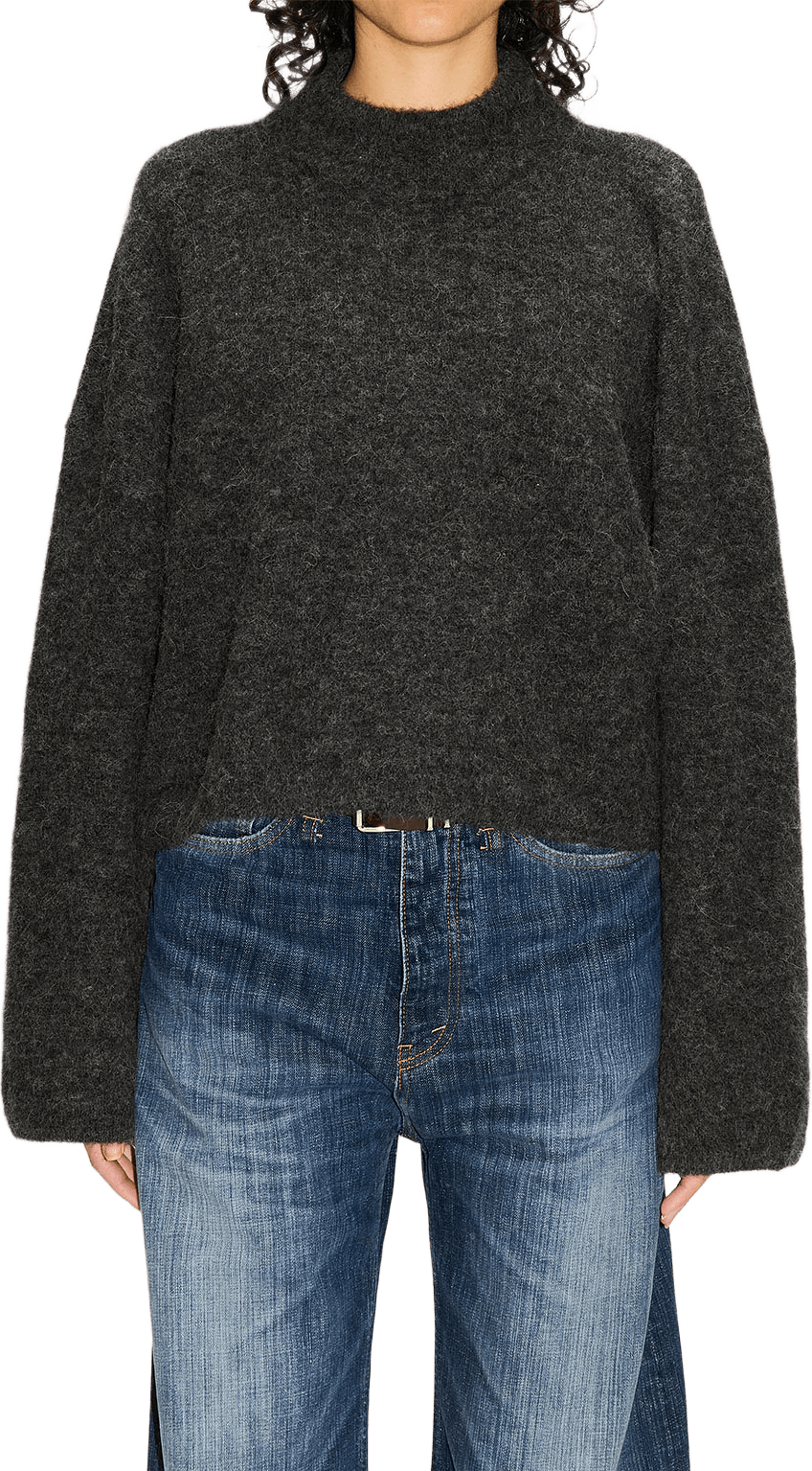 Aperto Turtle Sweater, från Hope, i färgen Black Melange Alpaca.