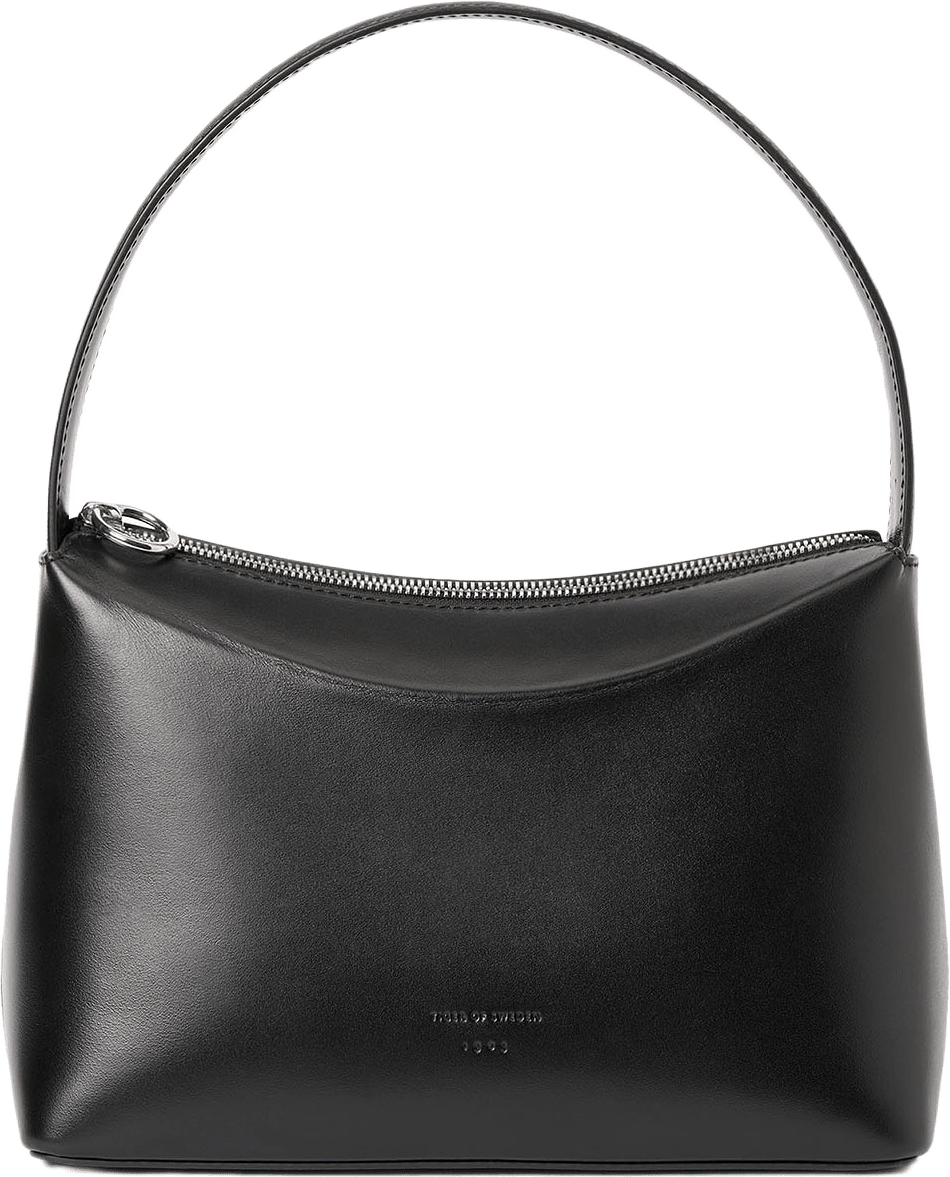 Conci Axelremsväska i Läder, från Tiger of Sweden, i färgen Black.