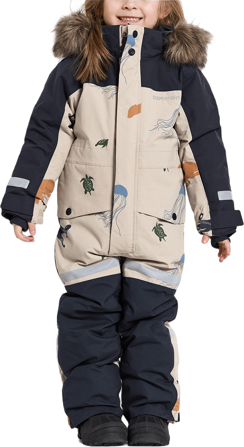Bjärven Kids Coverall, från Didriksons, i färgen Winter Ocean Multi Reflex.