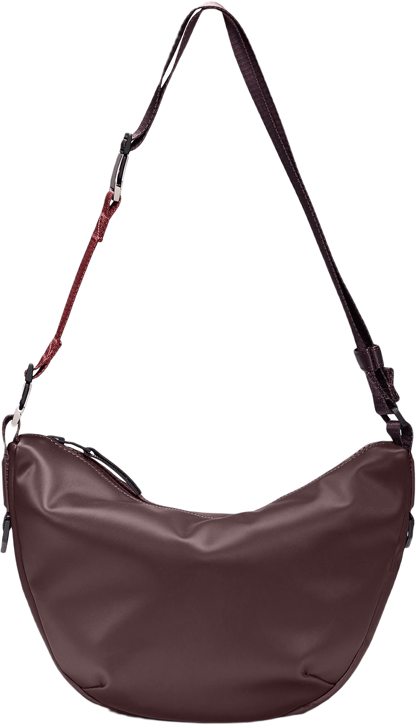 Valera Shoulder Bag W3, från Rains, i färgen Depth.