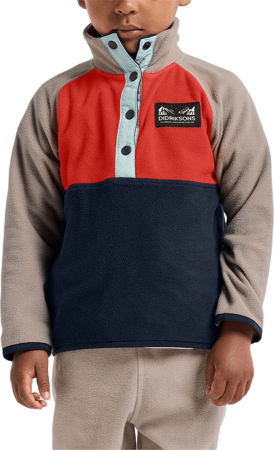 Monte Half button, från Didriksons, i färgen Paprika.