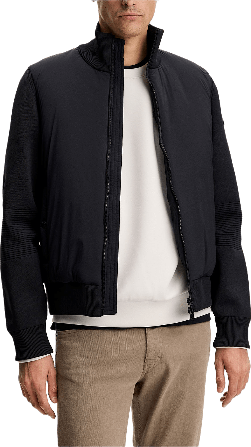 Ebbe Tech Knit Hybrid, från J.Lindeberg, i färgen Black.