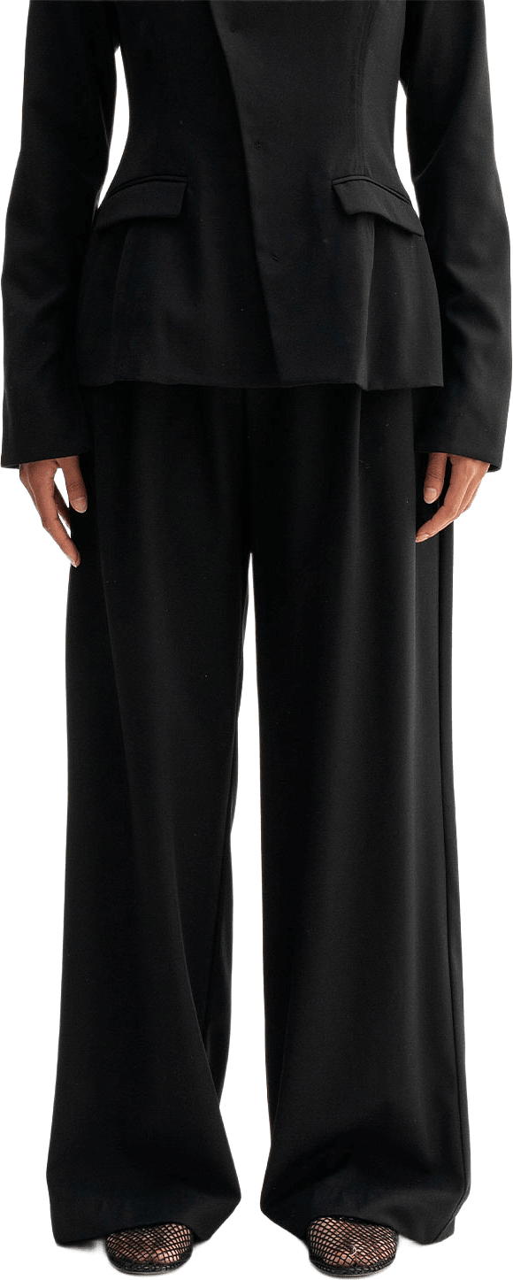 Mel Heavy Wool Trousers, från Ahlvar Gallery, i färgen Black.