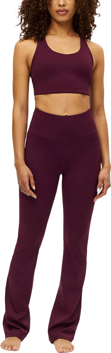 Legacy Flare High Waist Tights, från Röhnisch, i färgen Winetasting.
