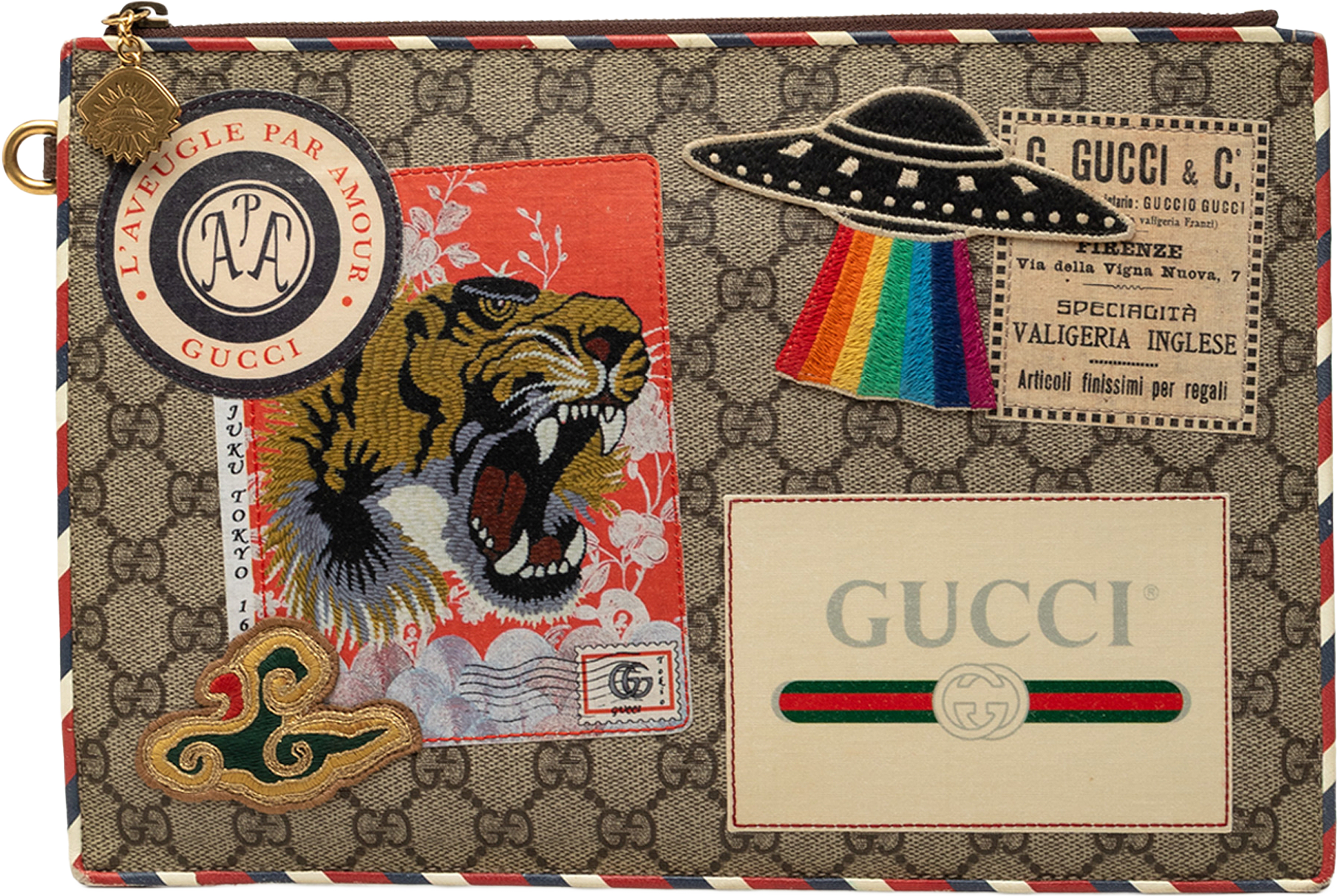 Gucci Gg Supreme Courrier Clutch, från Luxclusif, i färgen beige.