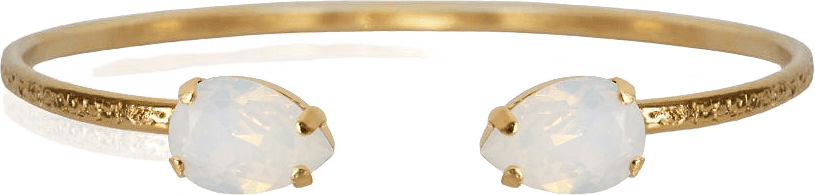 Petite Drop Bracelet White Opal, från Caroline Svedbom, i färgen Gold.