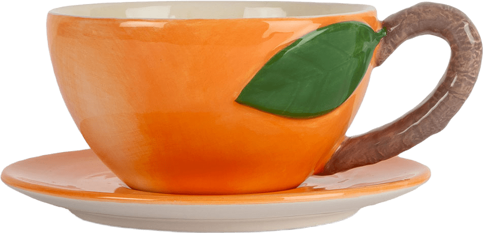 Kopp med fat Peach, från Byon, i färgen Persika.