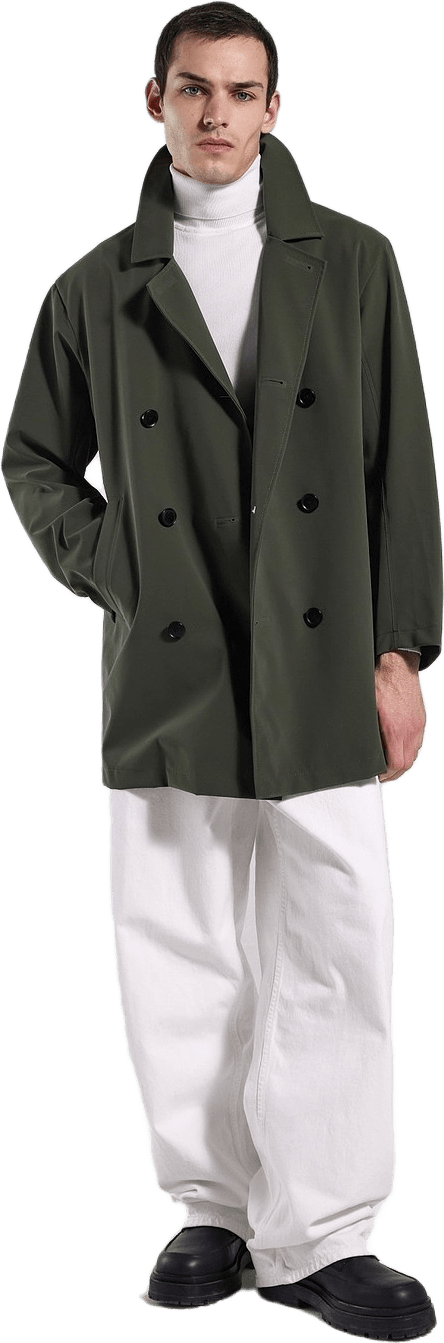 Åtvidaberg Raincoat, från Stutterheim, i färgen green.