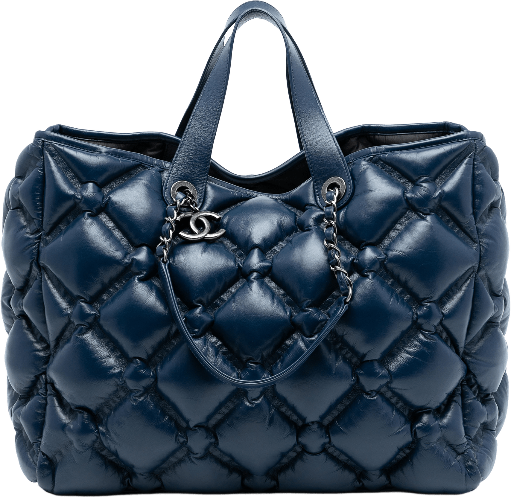 Chanel Large Quilted Leather Chesterfield Shopping Tote, från Luxclusif, i färgen dark blue.