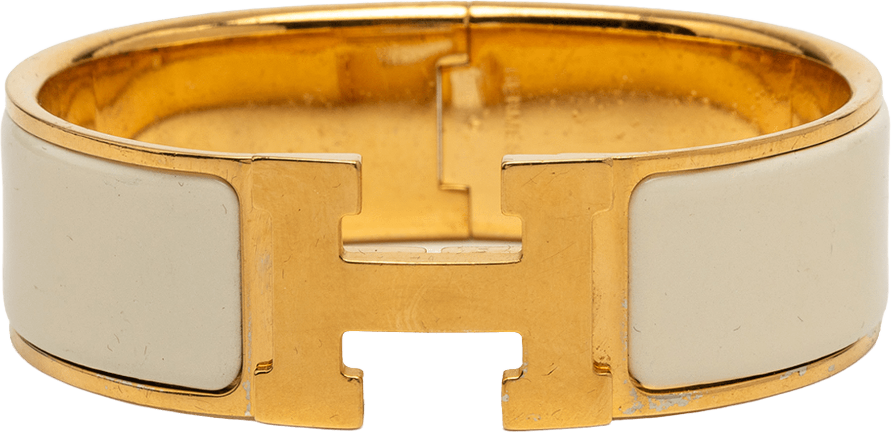 Hermès Wide Enamel Clic Clac H Bracelet Gm, från Luxclusif, i färgen off white.