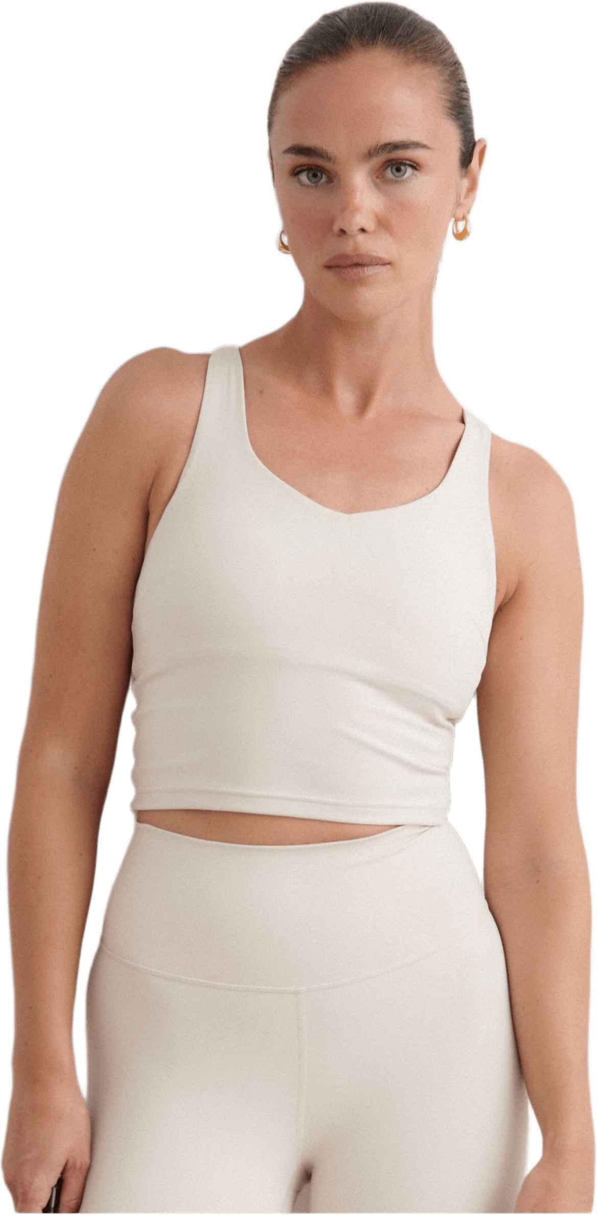 Sculpting Strappy Bralette, från aim'n, i färgen sand.