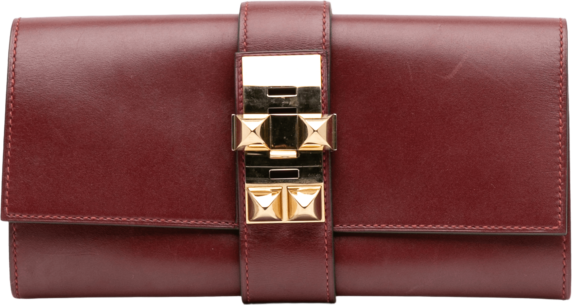 Hermès Swift Medor Clutch 23, från Luxclusif, i färgen bordeaux.