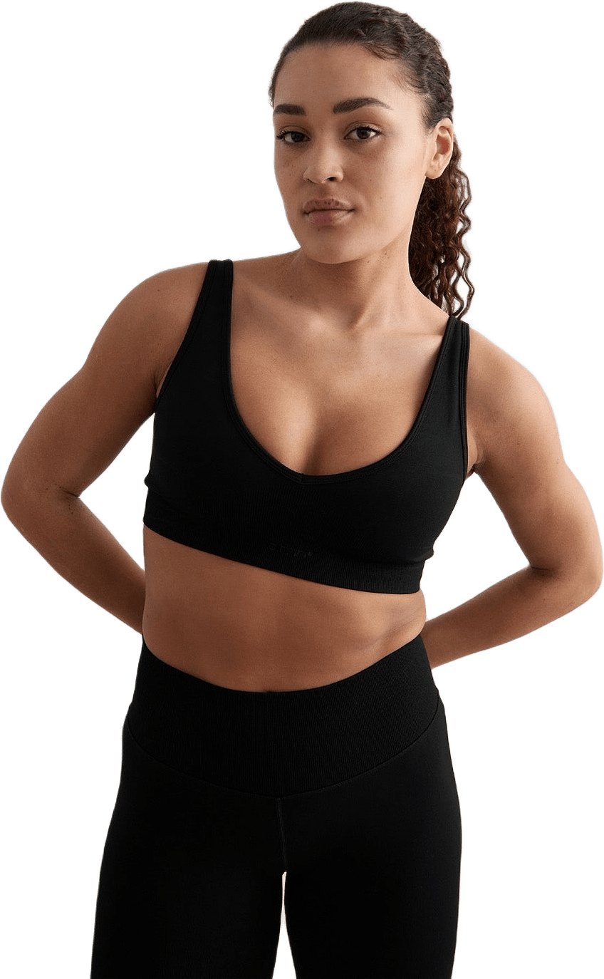 Shape Seamless Deep Cut Bra, från aim'n, i färgen black.