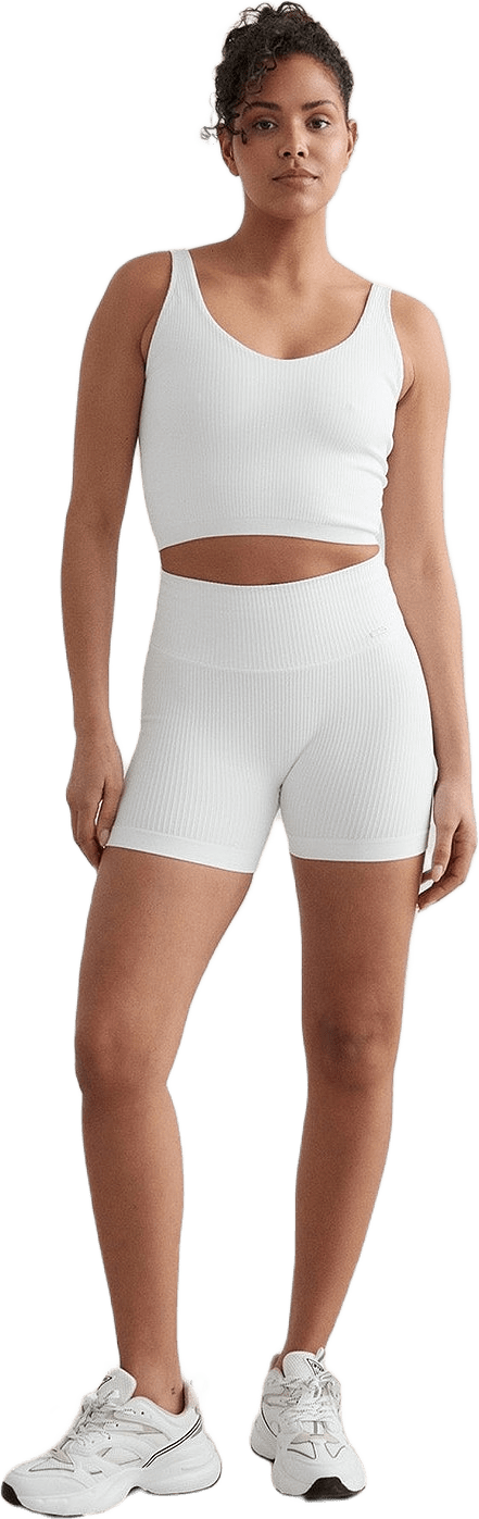 White Ribbed Seamless Midi Biker Shorts, från aim'n, i färgen white.