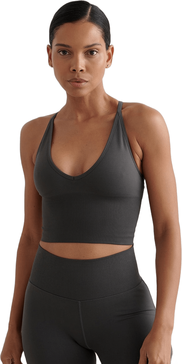 Shape Seamless Cross Back Bralette, från aim'n, i färgen shadow grey.