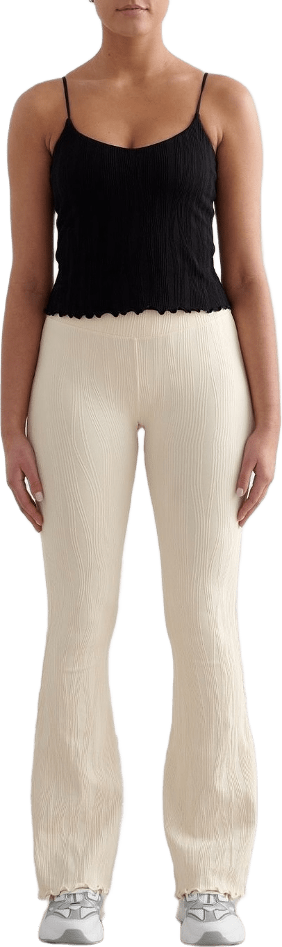 Tulip Flare Tights, från aim'n, i färgen almond white.