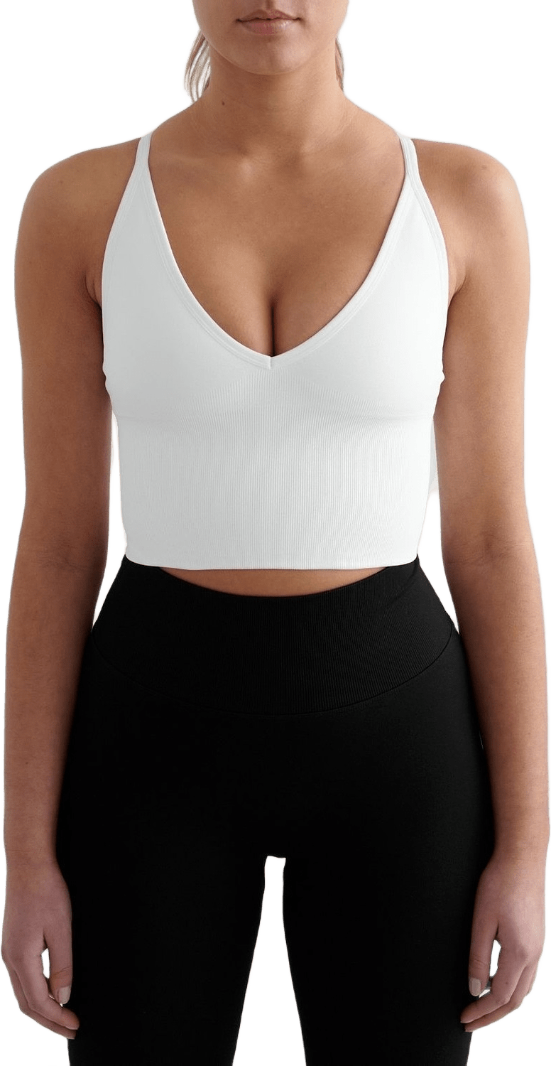 Shape Seamless Cross Back Bralette, från aim'n, i färgen white.