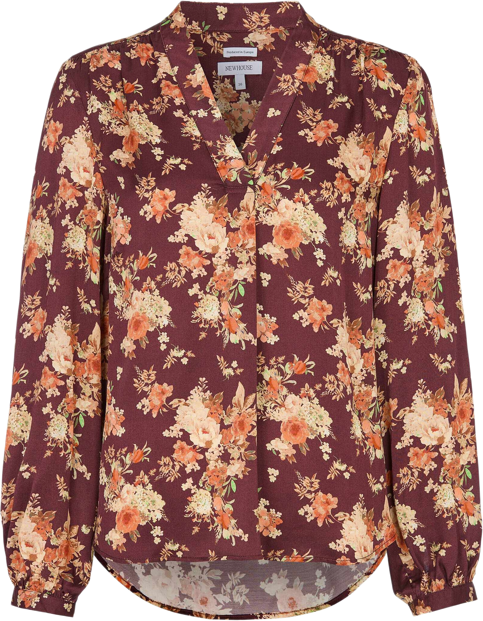 Celina Blouse, från Newhouse, i färgen djup vinröd.