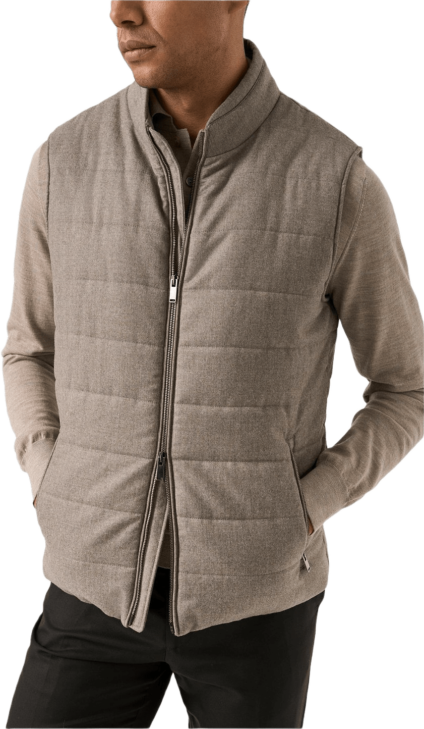 Vadderad Väst, från Eton, i färgen beige.