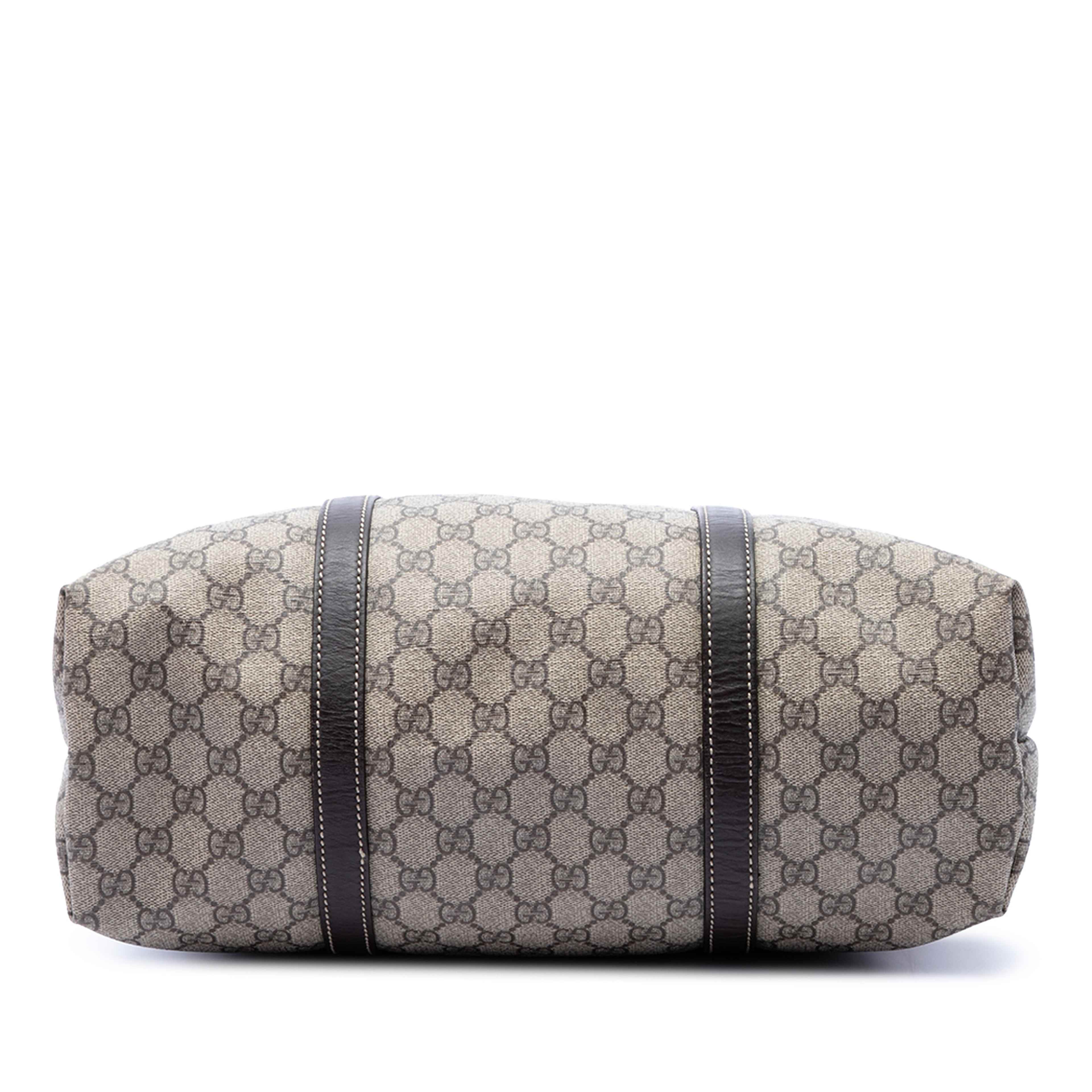 Gucci Gg Supreme Joy Vertical Tote, från Luxclusif, i färgen brun. Klicka för att öppna bilden i stort format