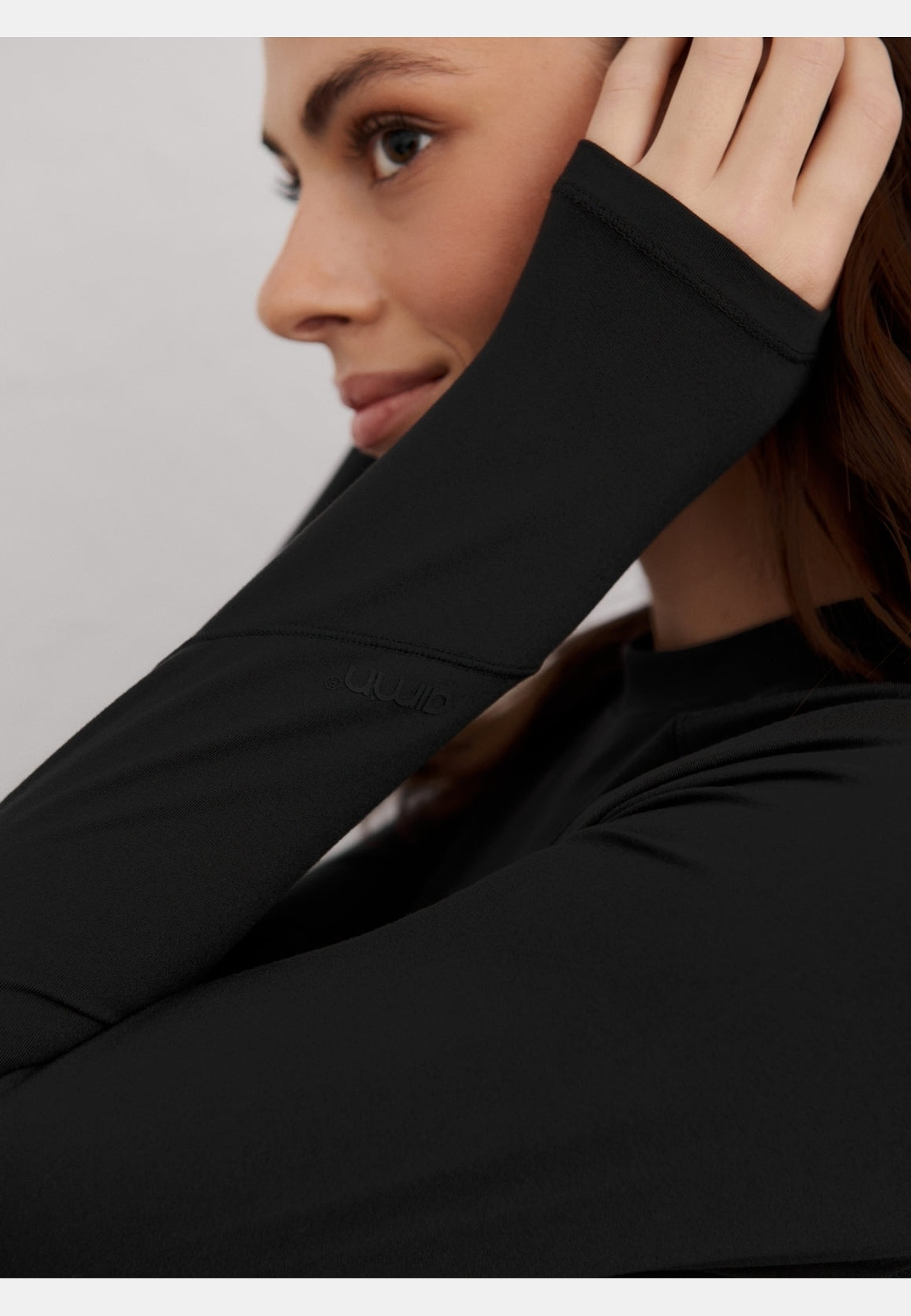 Baselayer Long Sleeve Top, från aim'n, i färgen black. Klicka för att öppna bilden i stort format