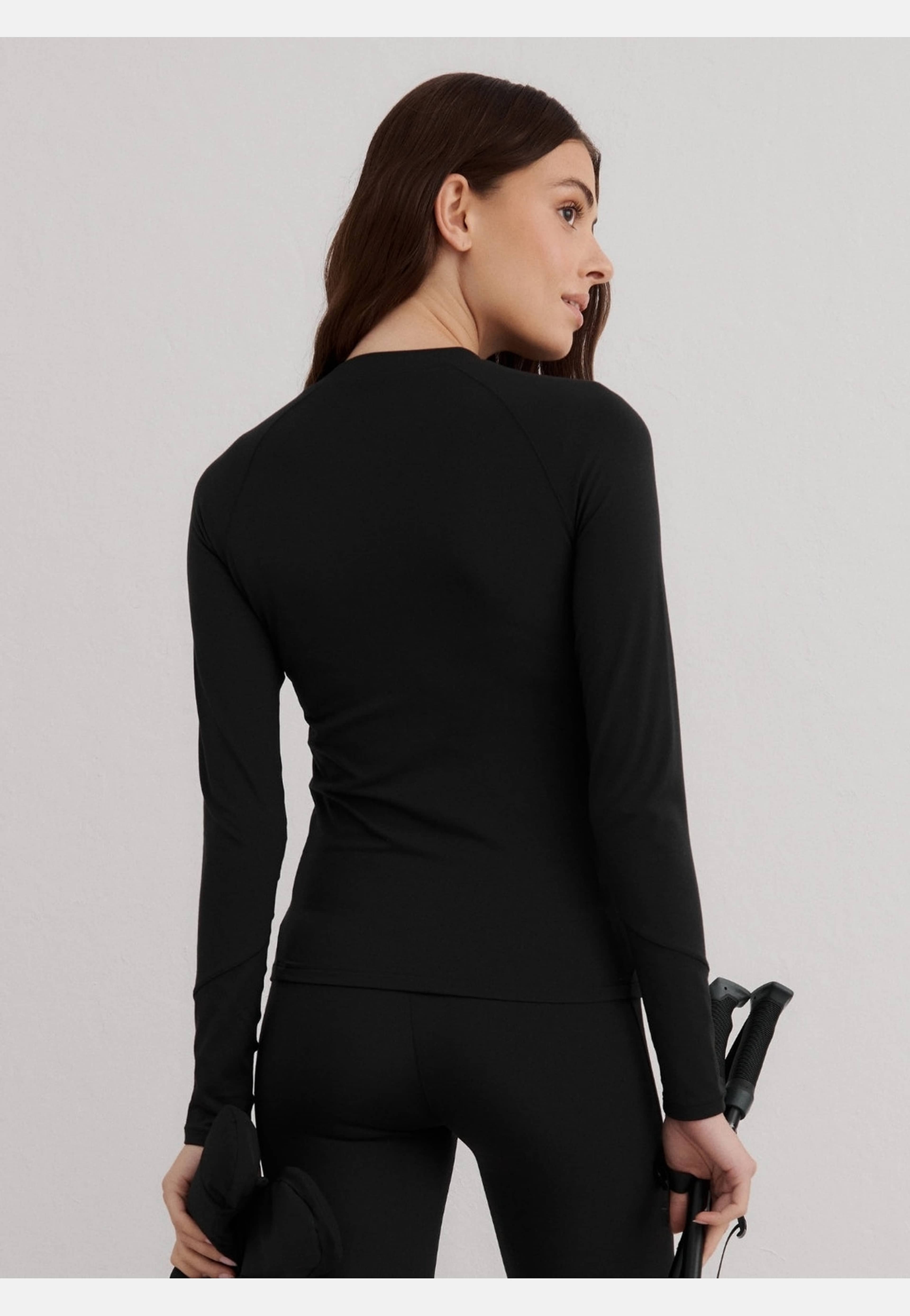 Baselayer Long Sleeve Top, från aim'n, i färgen black. Klicka för att öppna bilden i stort format