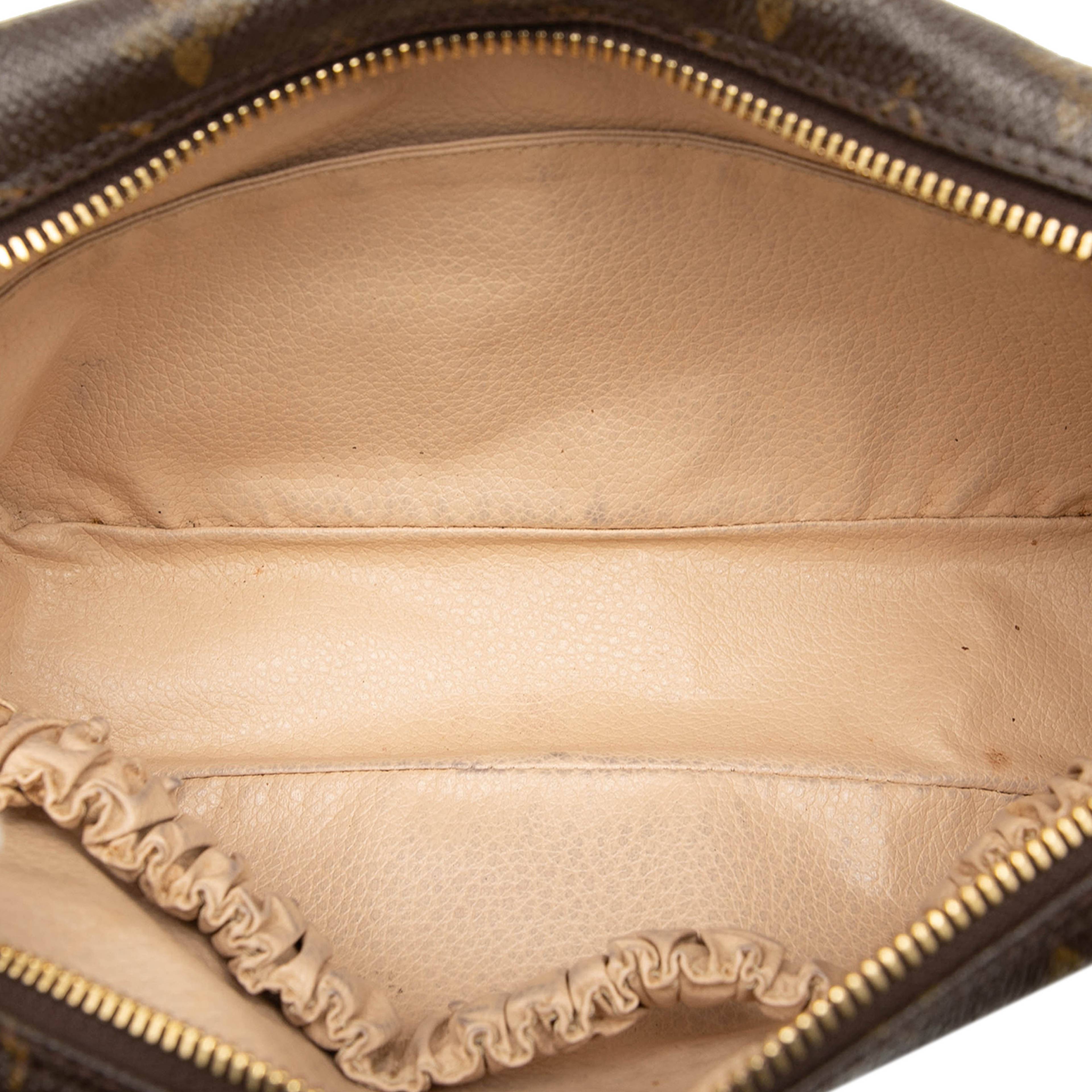 Louis Vuitton Monogram Trousse Toilette 23, från Luxclusif, i färgen brown. Klicka för att öppna bilden i stort format