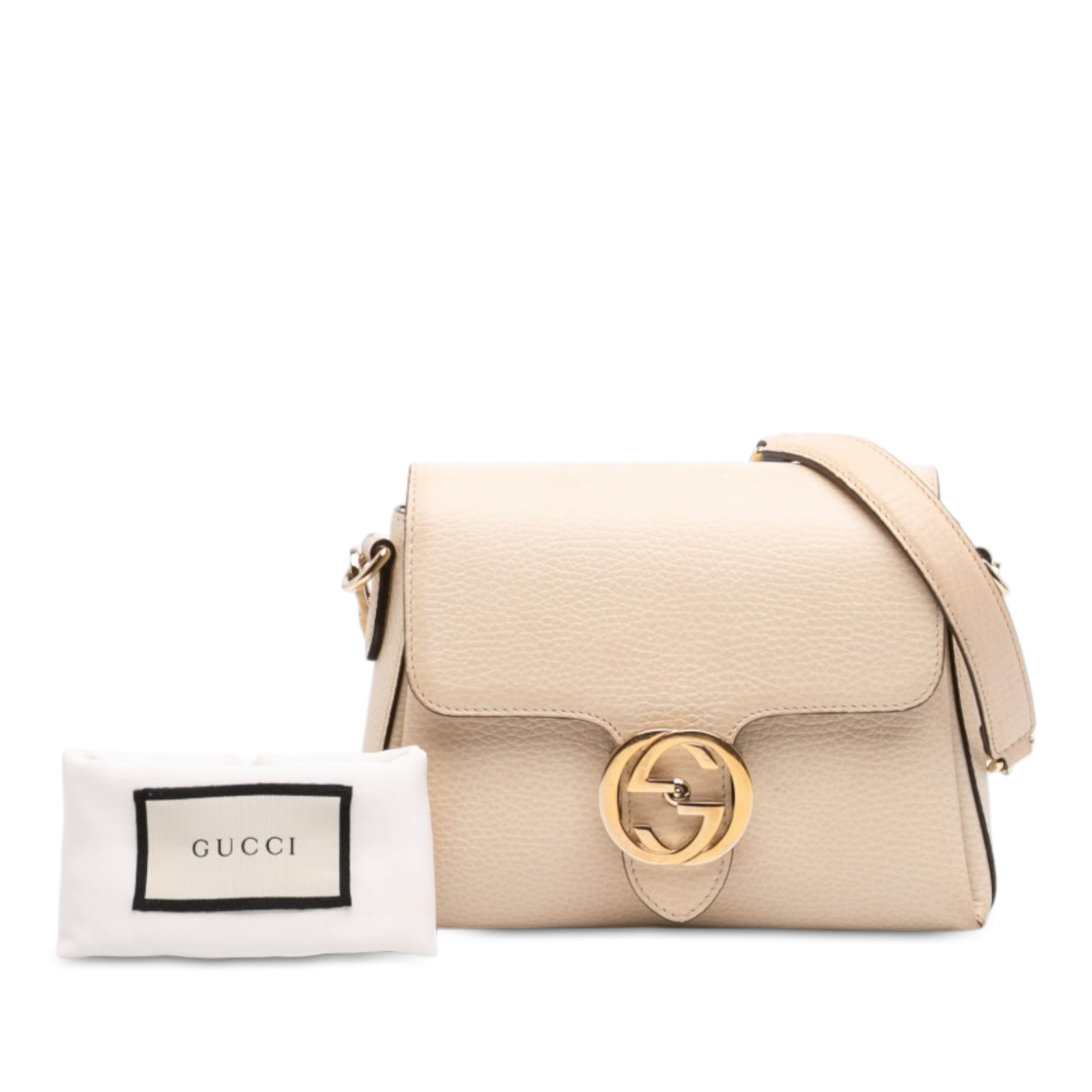 Gucci Small Dollar Calfskin Interlocking G Crossbody, från Luxclusif, i färgen vit. Klicka för att öppna bilden i stort format