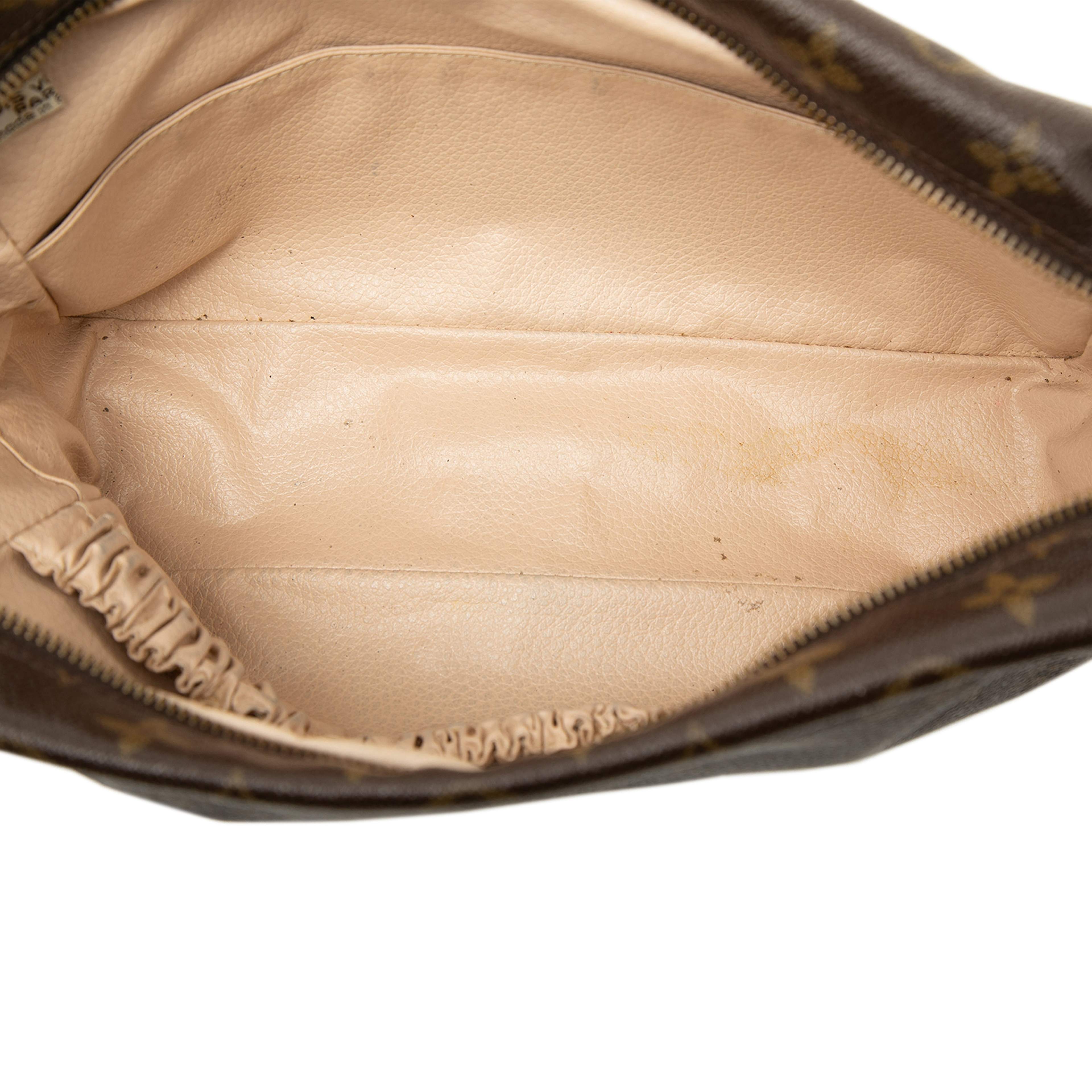 Louis Vuitton Monogram Trousse Toilette 28, från Luxclusif, i färgen brun. Klicka för att öppna bilden i stort format