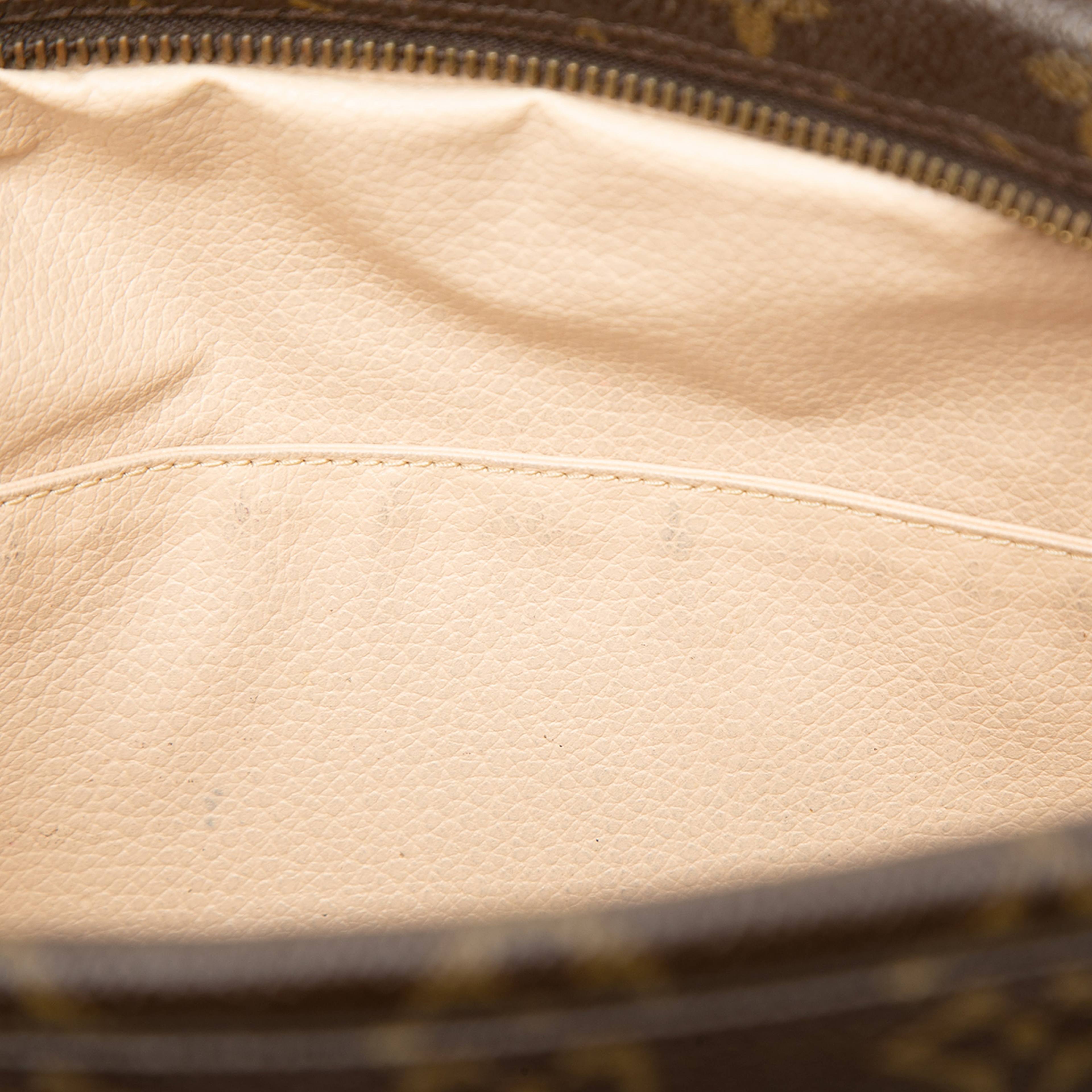 Louis Vuitton Monogram Trousse Toilette 28, från Luxclusif, i färgen brun. Klicka för att öppna bilden i stort format