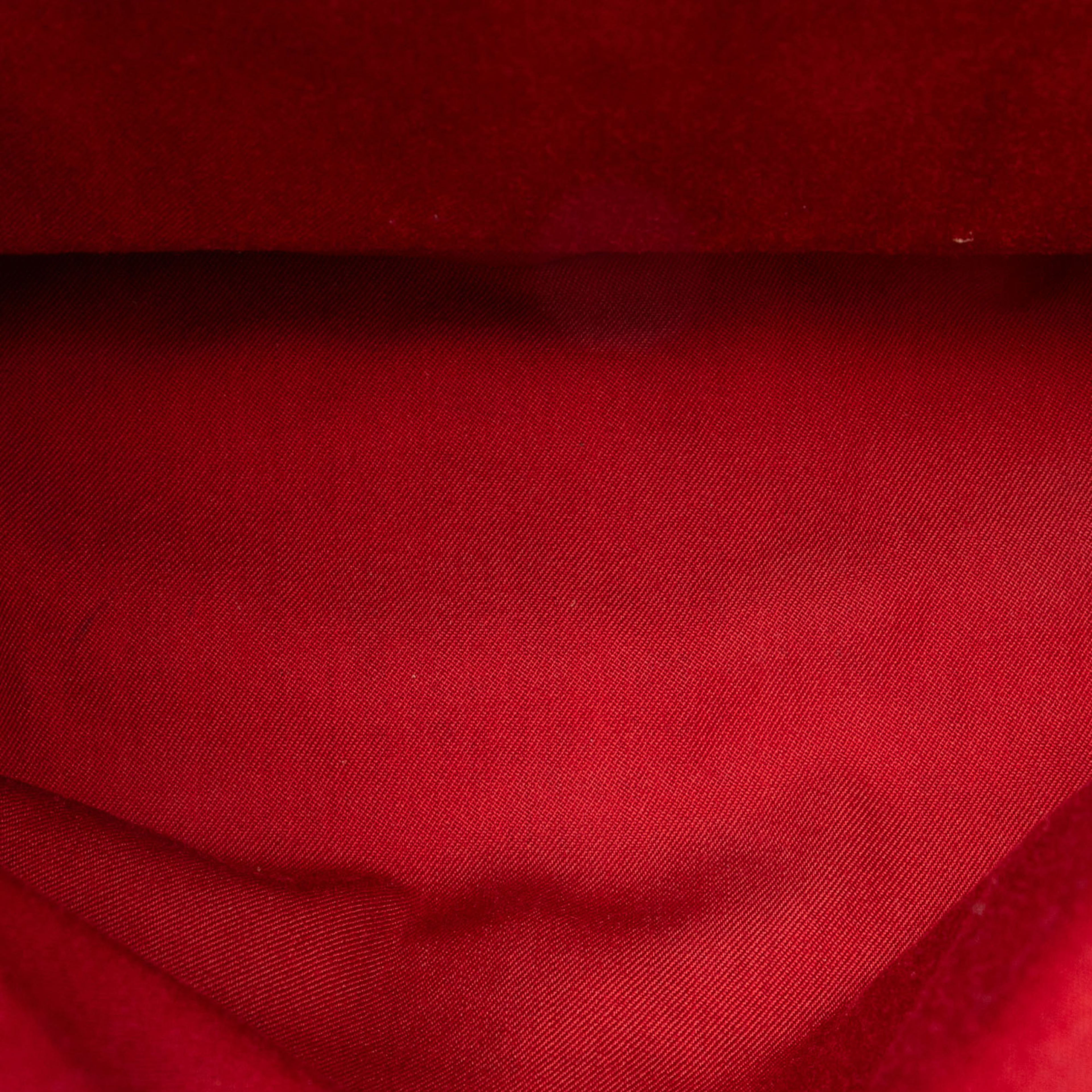 Hermès Toile Herbag Zip 31, från Luxclusif, i färgen orange. Klicka för att öppna bilden i stort format