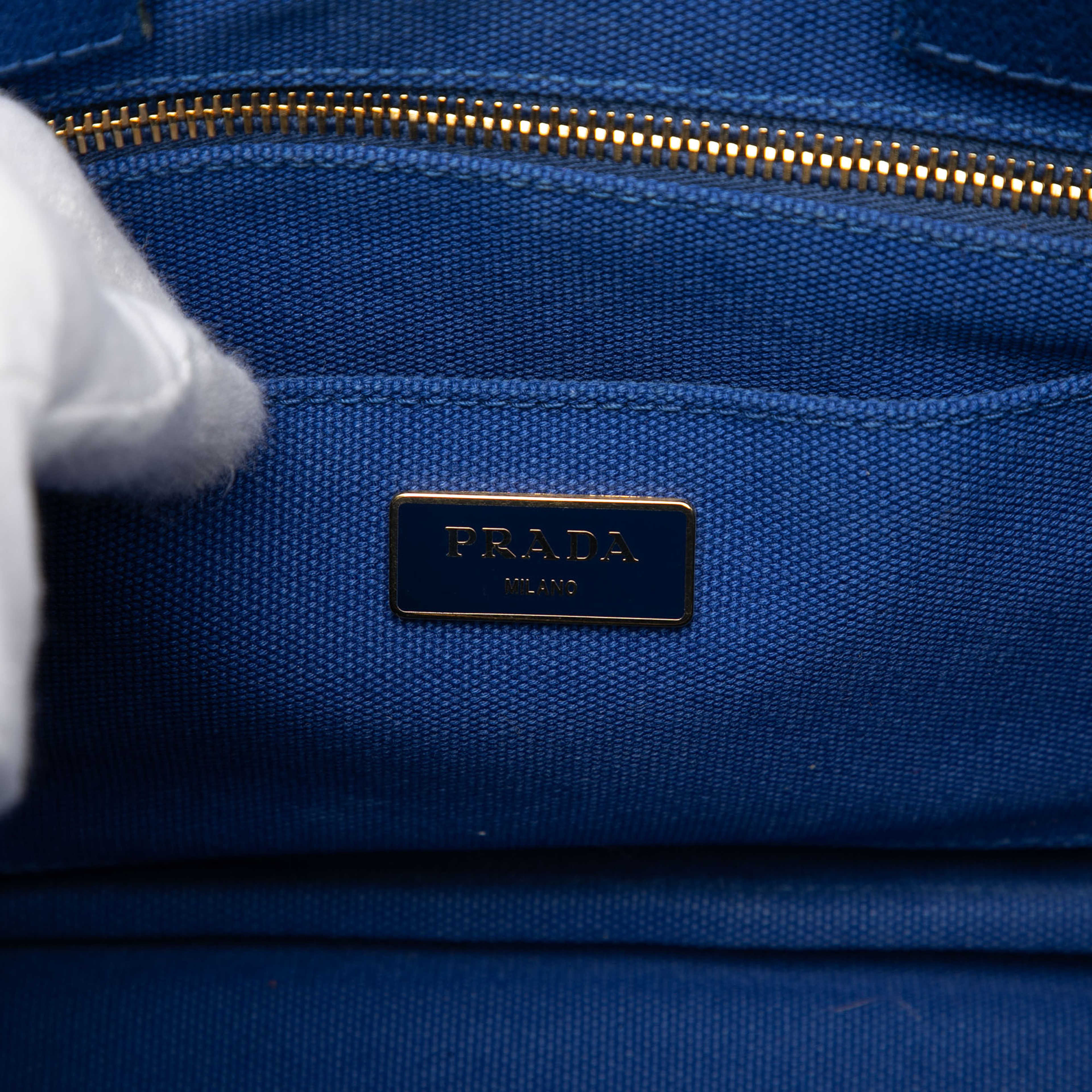 Prada Canvas Canapa Logo Satchel, från Luxclusif, i färgen blue. Klicka för att öppna bilden i stort format