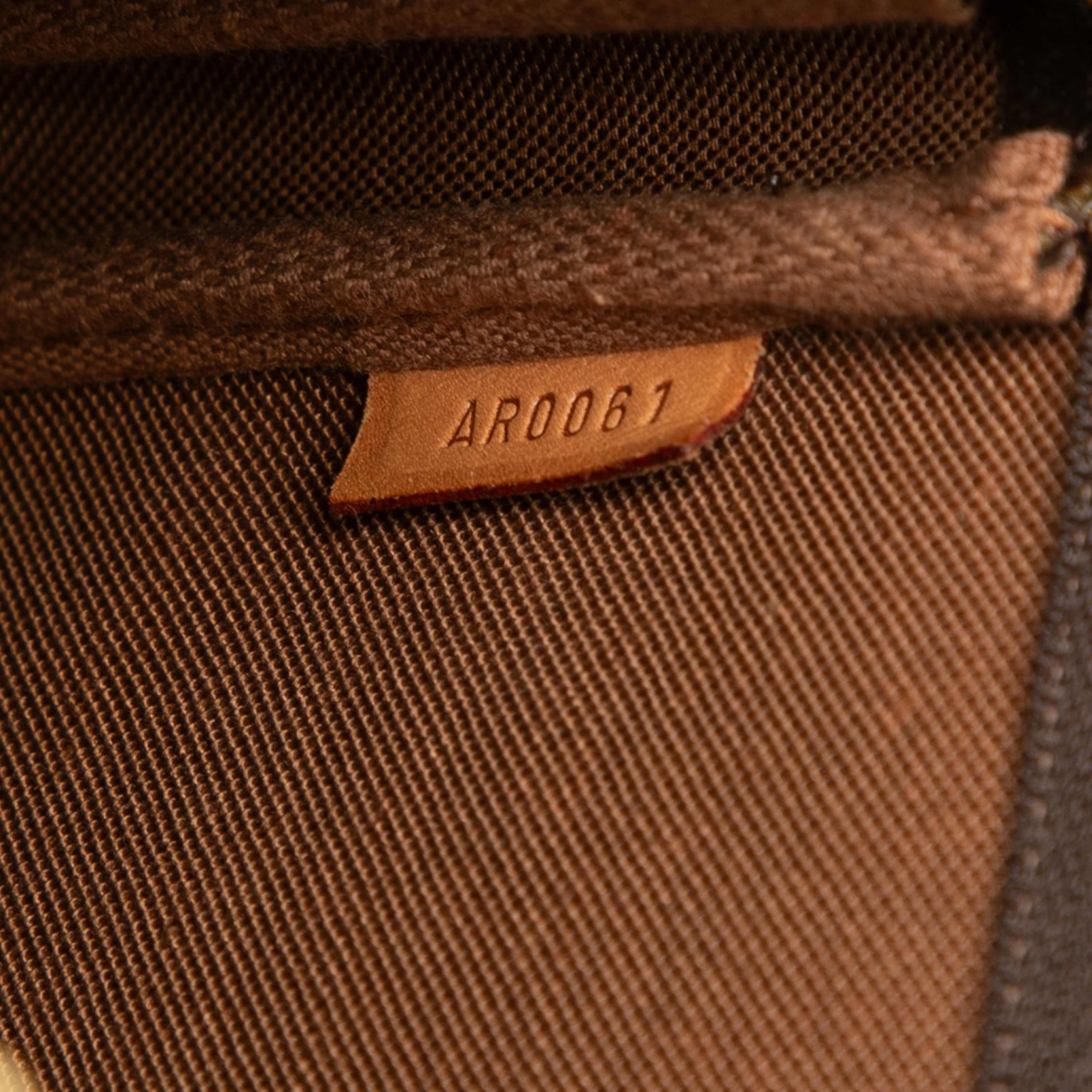 Louis Vuitton Monogram Pochette Accessoires, från Luxclusif, i färgen brown. Klicka för att öppna bilden i stort format