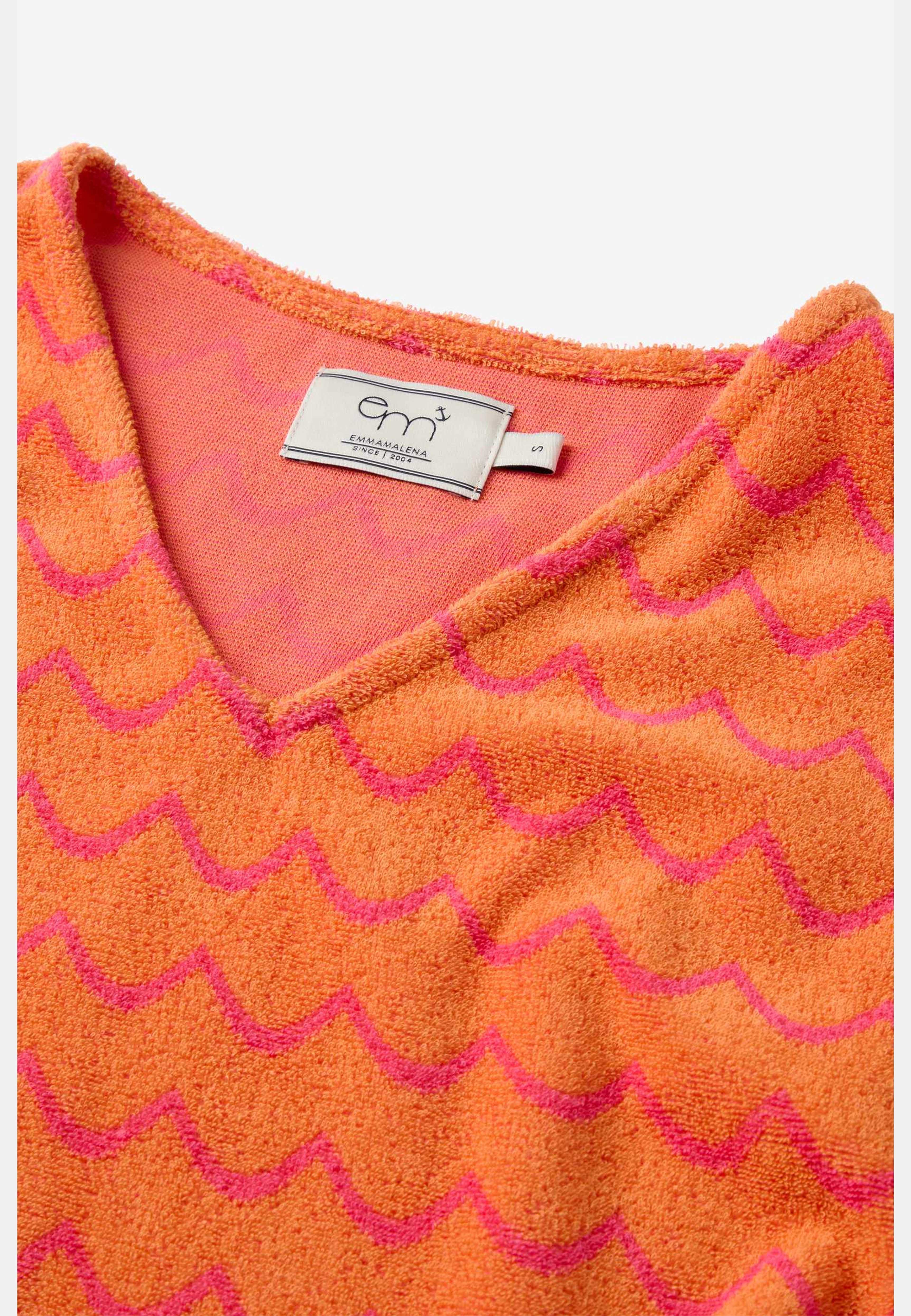 Hilda Frotté Klänning Våg Orange Rosa, från emmamalena, i färgen orange. Klicka för att öppna bilden i stort format