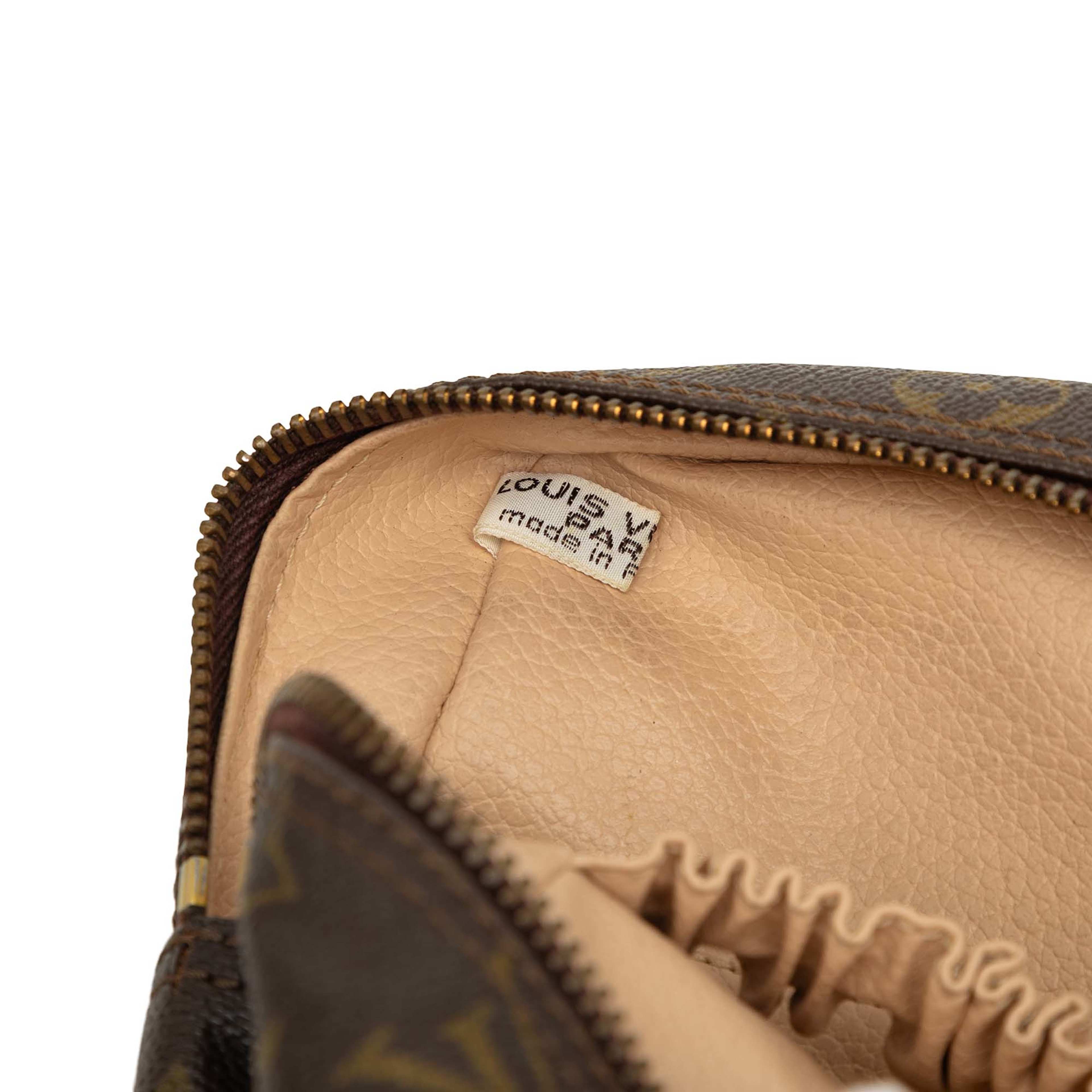 Louis Vuitton Monogram Trousse Toilette 28, från Luxclusif, i färgen brun. Klicka för att öppna bilden i stort format