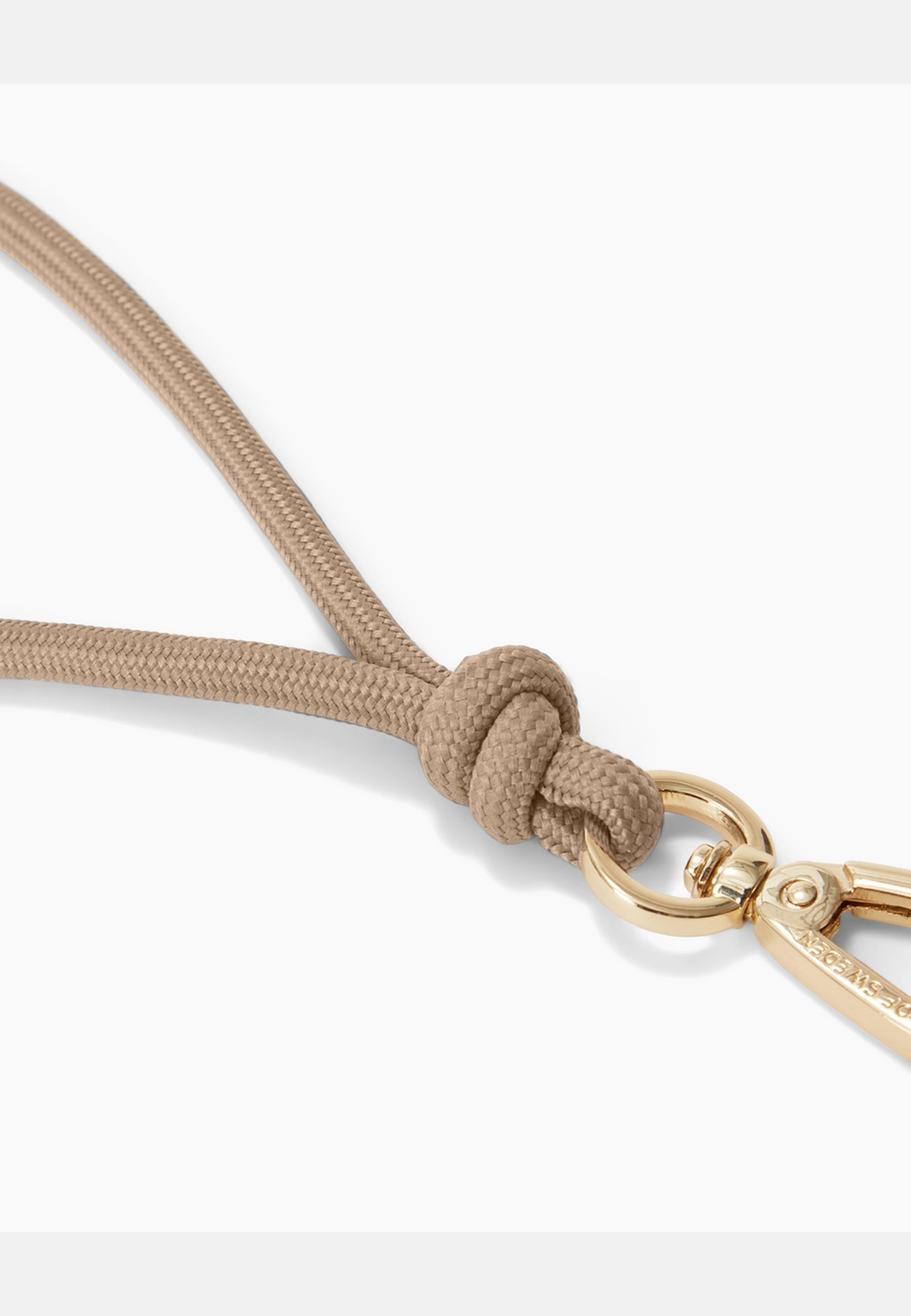 Cord Phone Wristlet, från Ideal Of Sweden, i färgen beige. Klicka för att öppna bilden i stort format